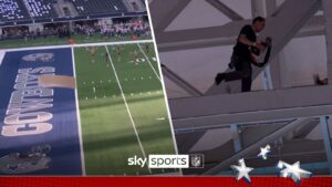 Shocking moment HUGE piece of metal falls from Cowboys' stadium roof onto field