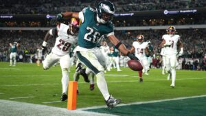 NFL 2024: Saquon Barkley scores two late touchdowns as Philadelphia Eagles defeat Washington Commanders 26-18 | NFL News