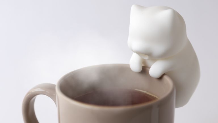 This adorable little robot cat will stop you burning your tongue on hot coffee